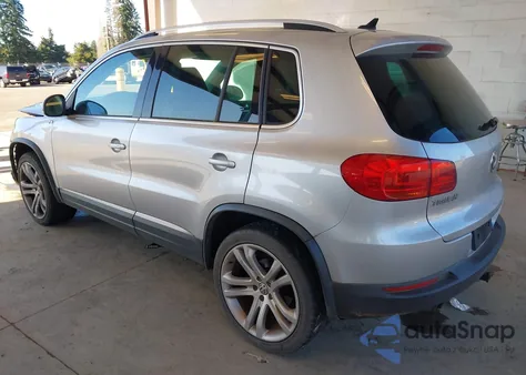 2012 Volkswagen Tiguan Sel z USA, uszkodzony, nr VIN WVGAV7AX9CW531897